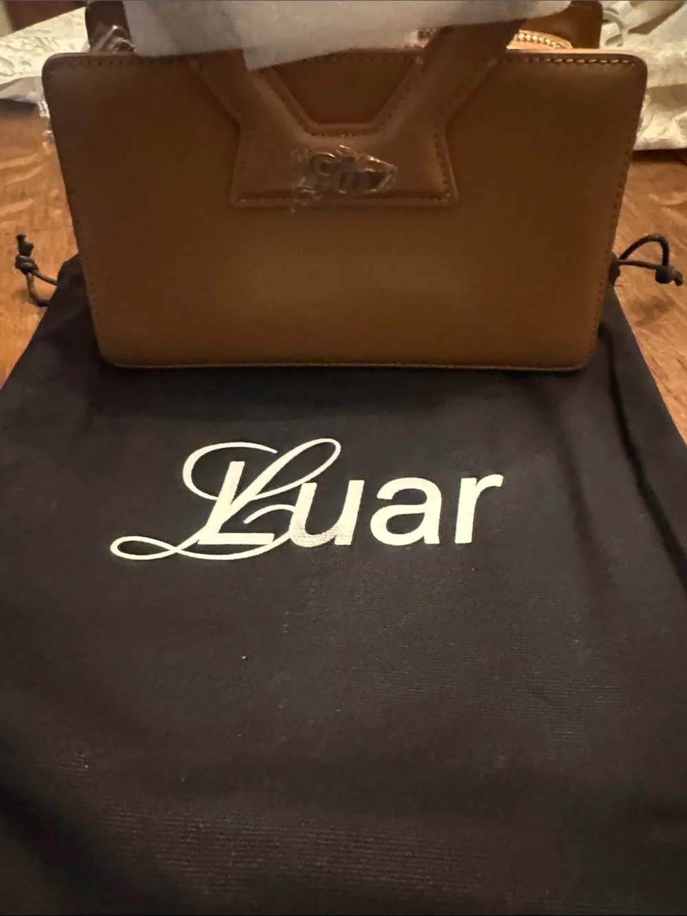 Luar sleek tan